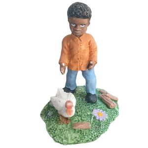 Vintage Ceramic Little Brown Boy Standing With A Duck Figurine
